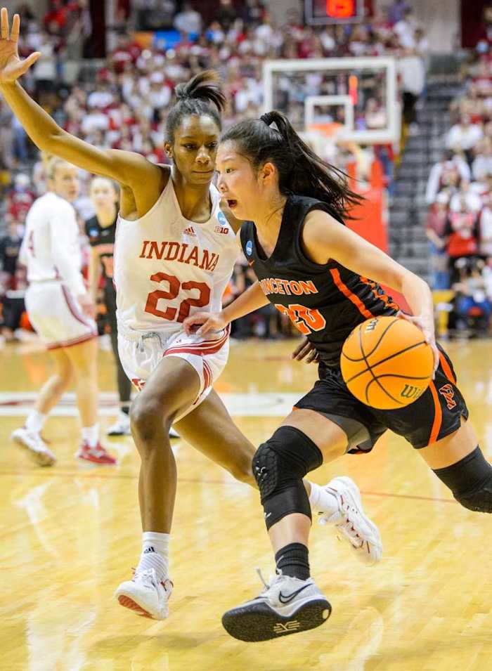 Chloe Moore-McNeil guards Princeton's Kaitlyn Chen.